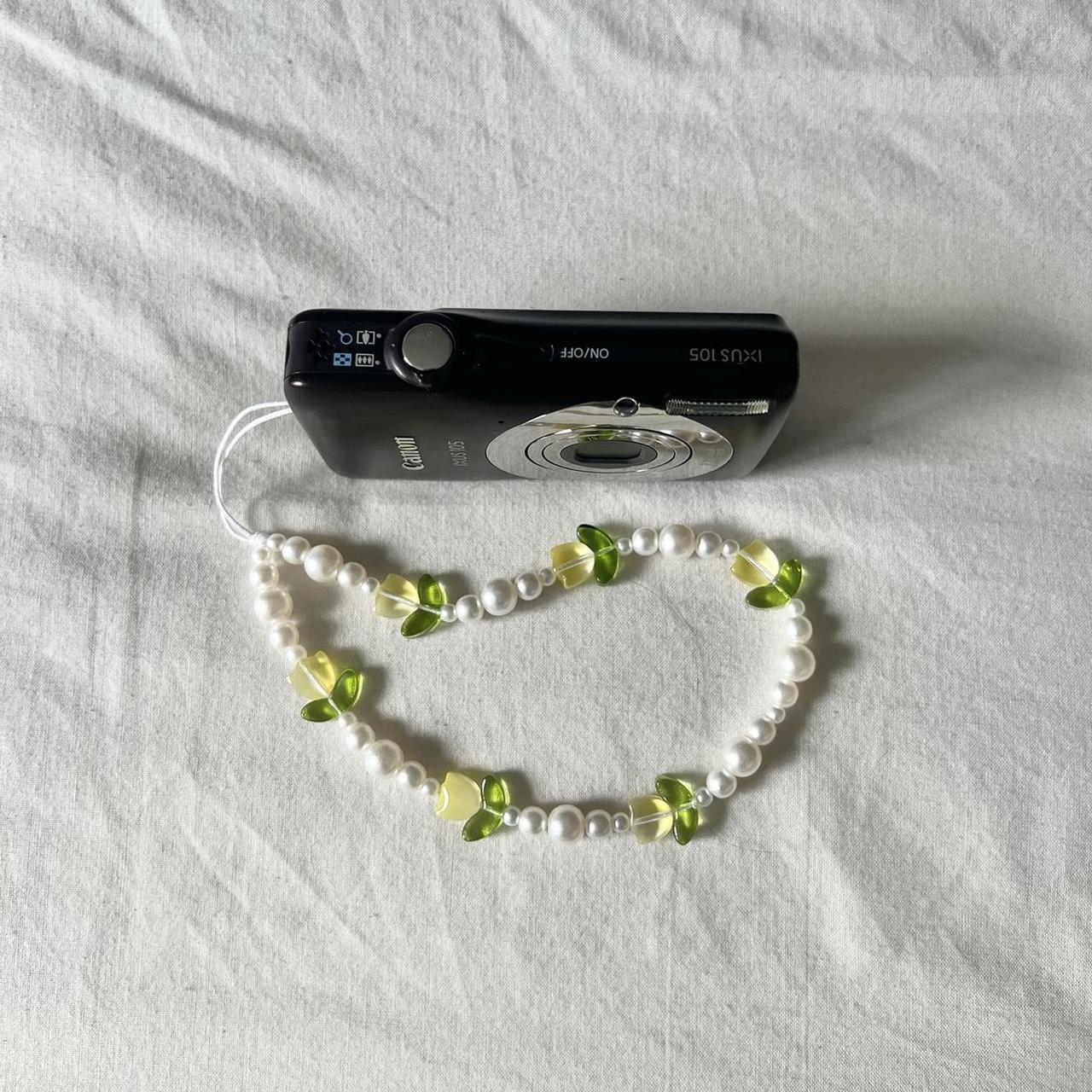 Used Canon Ixus 105 12.1MP Brown Digital Camera