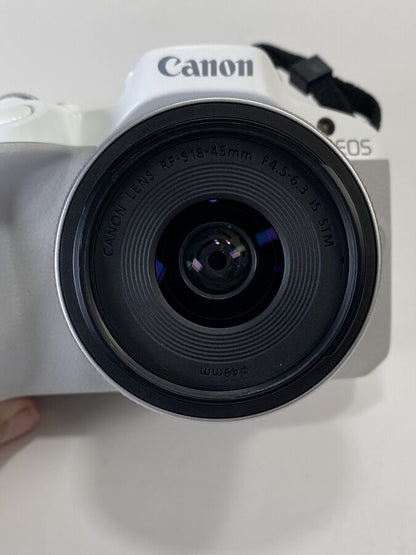 White Canon EOS R50 4K Video Mirrorless Camera with RF-S 18-45mm f/4.5-6.3